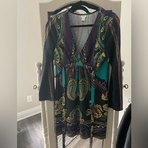 Great fall/winter dress. size L but runs slightly small. great condition